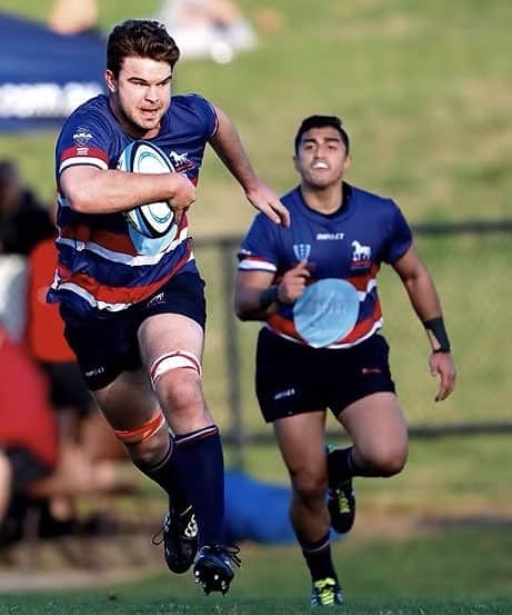 rugby-player-running-with-ball